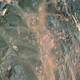 Illustration for article titled See Nevadas Hellish Nuclear Moonscape From Above